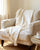 Hand Woven Ivory Throw Blanket with Tufts and Tassels