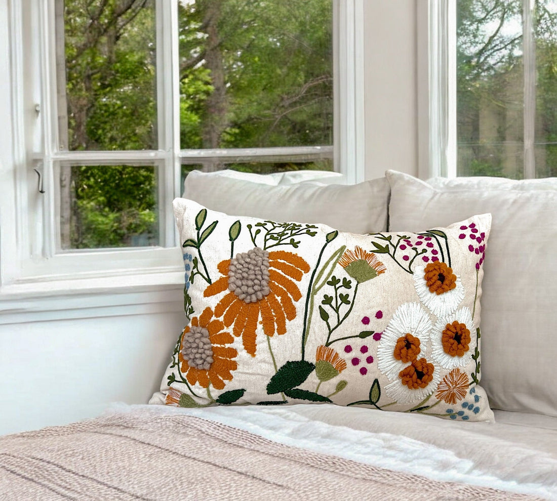 Luxury embroidered rectangular throw pillow with blue and green floral design on white fabric. Elegant decorative cushion for bedroom, living room, or coastal home decor. Stylish, cozy, and high-quality.