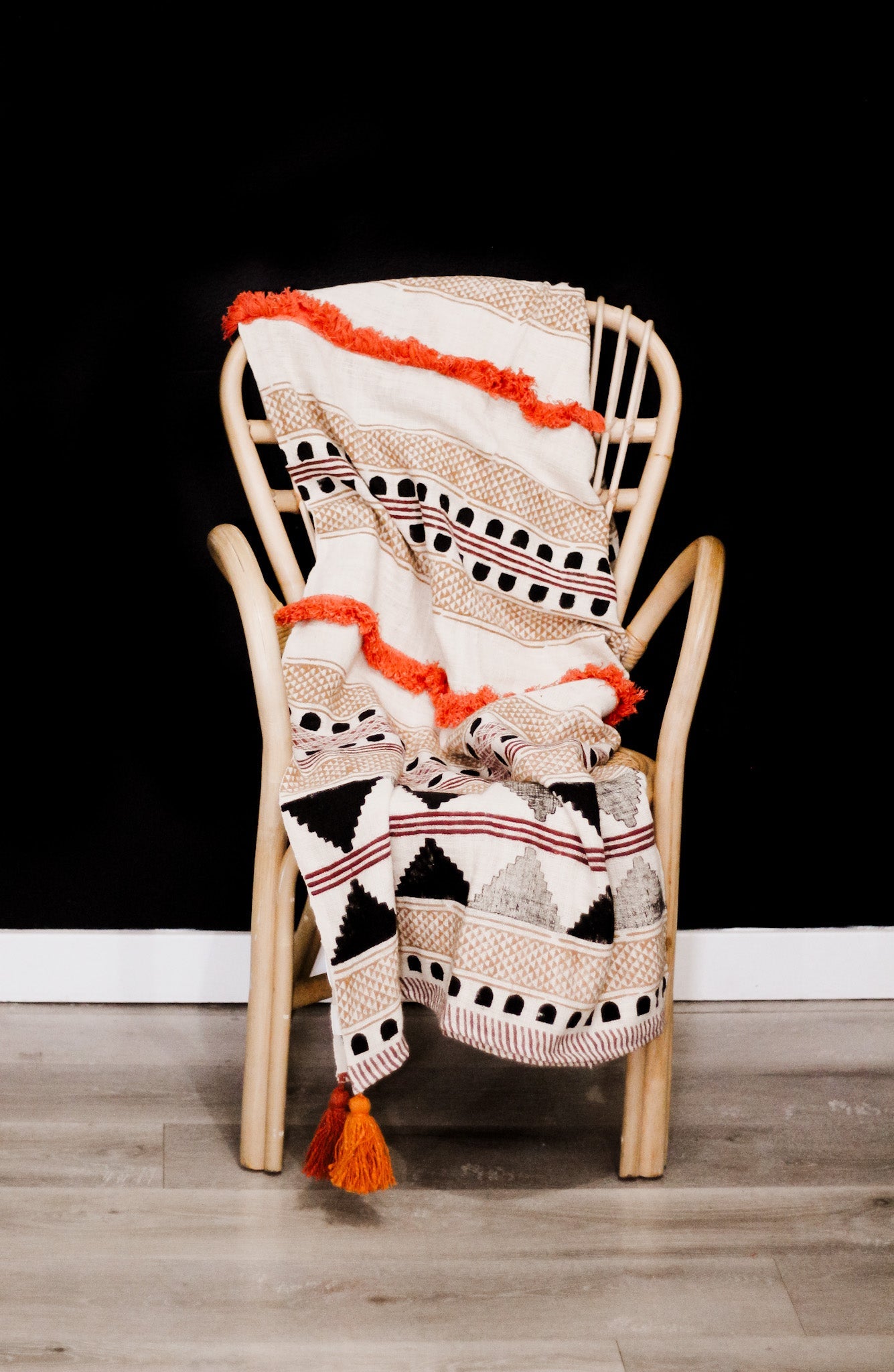 Boho handwoven cotton throw blanket with tassels in multicolor design